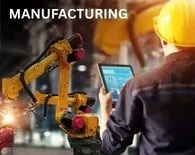 Engineer monitoring robotic machinery on tablet in smart manufacturing for digital marketing