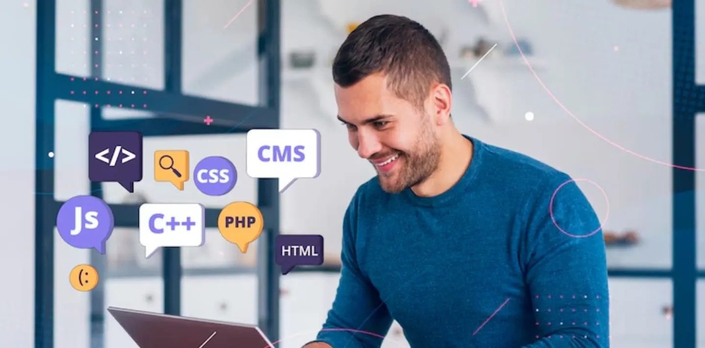 Web developer working on laptop with floating code bubbles for HTML, CSS, JavaScript in India